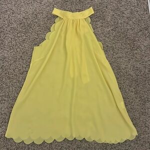 Yellow sheer canary halter blouse with scalloped trim
Size small